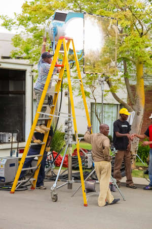 Johannesburg, South Africa, September 08, 2010, Behind the scenes on a Television advert Film Set on location in wealthy suburban neighborhoodのeditorial素材