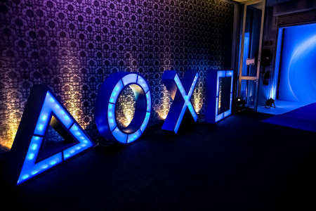 Johannesburg, South Africa - December 10 2013: Play Station illuminated icons at PS4 launch eventのeditorial素材