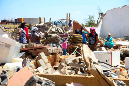Johannesburg, South Africa - October 04 2011: Tornado Damaged Homes in a small South Africa Townshipのeditorial素材