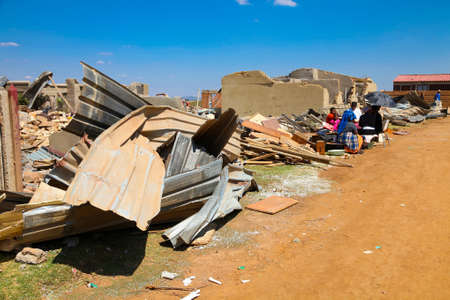Johannesburg, South Africa - October 04 2011: Tornado Damaged Homes in a small South Africa Townshipのeditorial素材