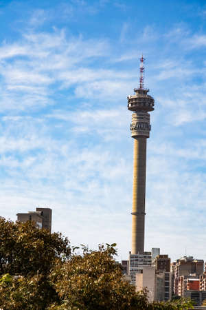 Johannesburg, South Africa - July 18, 2014: Telkom communications tower and apartment buildings in Hilbrowのeditorial素材