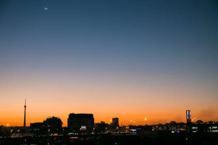 Johannesburg, South Africa - July 6, 2016: Sunset Silhouette Skyline looking over Communications tower and buildingsのeditorial素材