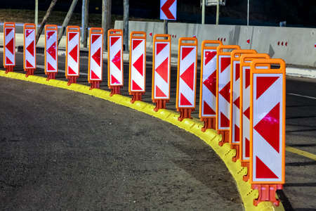 Johannesburg, South Africa - October 24 2011: Motorway Signs and reflectors on Highway at nightのeditorial素材