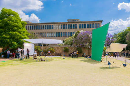 Johannesburg, South Africa - October 09 2018: Behind the scenes of a Television advert Film Set on location at a University Campusのeditorial素材