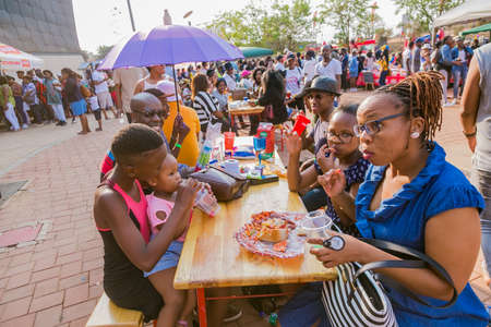 Soweto, South Africa - September 17, 2017: Diverse African people at a bread based street food outdoor festivalのeditorial素材