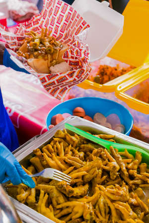 Soweto, South Africa - September 17, 2017: Diverse African vendors cooking and serving various bread based street food at outdoor festivalのeditorial素材