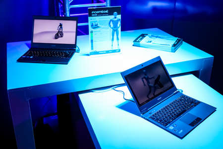 Johannesburg, South Africa - June 21, 2012: Toshiba Laptop on display with bright colorful lightingのeditorial素材