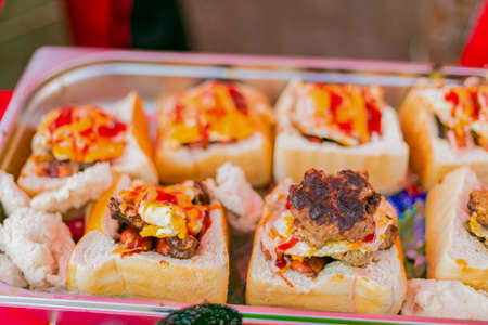 Soweto, South Africa - September 8, 2018: Close up of Traditional African bread based street food called Bunny Chow at outdoor festivalのeditorial素材