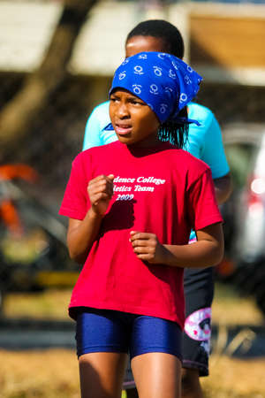 Pretoria, South Africa - August 26 2009: Diverse African Primary School children doing physical exercise PT lessonのeditorial素材