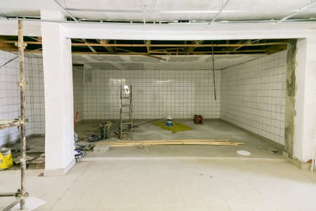 Johannesburg, South Africa - October 17, 2016: Inside interior of a small spaza shop grocery store undergoing renovation improvements in Soweto townshipのeditorial素材
