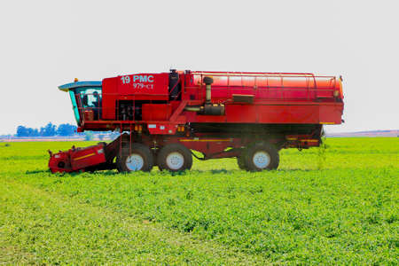 Johannesburg, South Africa - October 27 2010: Commercial Pea Farming with a Combine Harvester