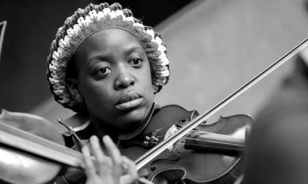 Johannesburg, South Africa - August 28 2010: Diverse youth at music school orchestraのeditorial素材