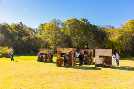 Johannesburg, South Africa - May 12 2018: People admiring a piece of art at Nirox Sculpture Parkのeditorial素材