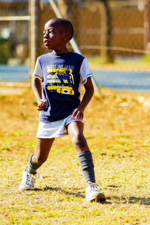 Pretoria, South Africa - August 26 2009: Diverse African Primary School children doing physical exercise PT lessonのeditorial素材