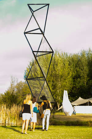 Johannesburg, South Africa - May 10 2014: People admiring a piece of art at Nirox Sculpture Parkのeditorial素材