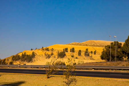 Johannesburg, South Africa, September 11, 2011, Gold Mining Dumps of Waste material next to the motorwayのeditorial素材