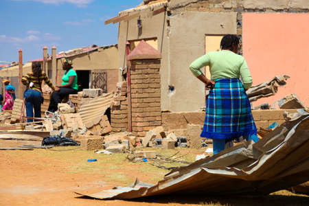 Johannesburg, South Africa - October 04 2011: Tornado Damaged Homes in a small South Africa Townshipのeditorial素材