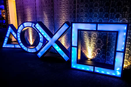 Johannesburg, South Africa - December 10 2013: Play Station illuminated icons at PS4 launch event