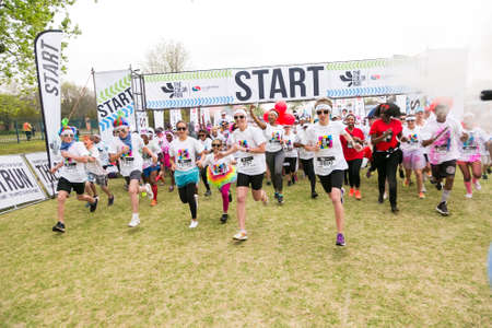 Johannesburg, South Africa, September 20, 2015, Diverse people running in The Color Run Marathon in...