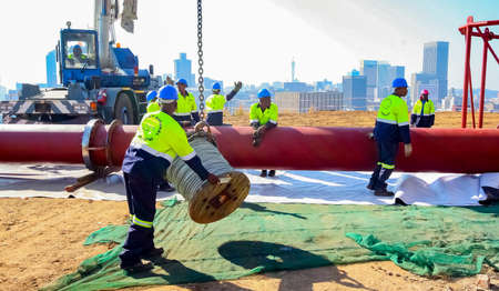 Johannesburg, South Africa - June 07 2010: Construction worker on a building siteのeditorial素材
