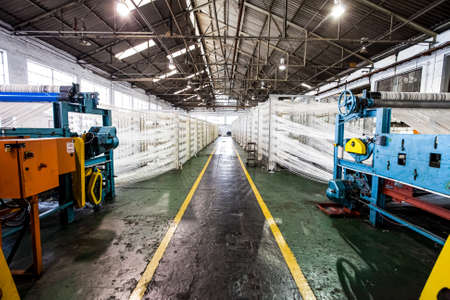 Johannesburg, South Africa - October 16, 2012: Cotton Thread lines for a copwinder weft assembly line loomのeditorial素材