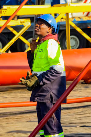 Johannesburg, South Africa - June 06 2010: Construction worker on a building siteのeditorial素材