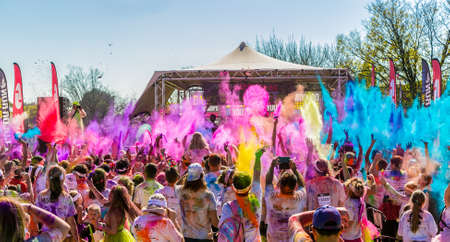 Johanneburg, South Africa,  05/21/2017, Young people having fun at The Color Run 5km Marathon, Bright color paint all over a large crowdのeditorial素材
