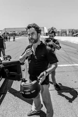 Johannesburg, South Africa - October 05 2013: Jay Kay of Jamiroquai driving an Aston Martin on Kyalami Race Trackのeditorial素材