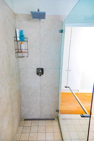 Cape Town, South Africa - February 6, 2020: Inside interior of empty bathroom and toilet in up-market house in the suburbsのeditorial素材