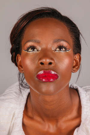 Johannesburg, South Africa - October 20 2009:  African Model with unusual make-up on her faceのeditorial素材