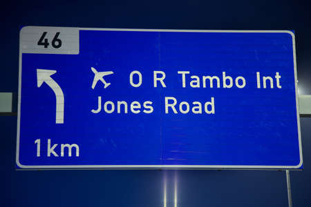 Johannesburg, South Africa - October 24 2011: Motorway Signs on Highway at nightのeditorial素材