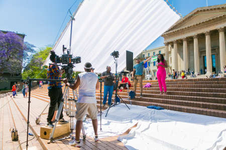 Johannesburg, South Africa - October 09 2018: Behind the scenes of a Television advert Film Set on location at a University Campusのeditorial素材