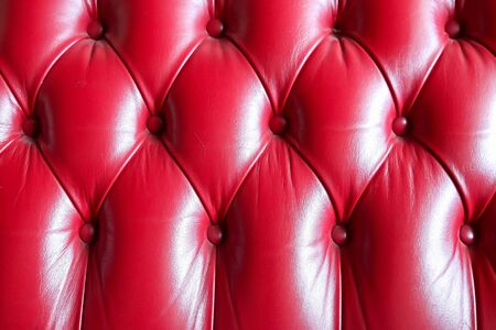 Red Diamond shape leather couch pattern texture for design backgroundの写真素材