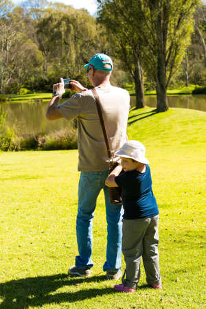 Johannesburg, South Africa - May 10 2014: Dad taking a selfie photo at food and wine festivalのeditorial素材