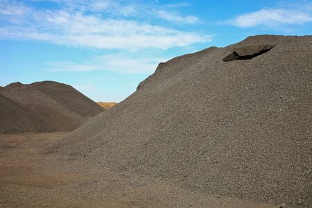 Large piles of processed Manganese rich ore rock