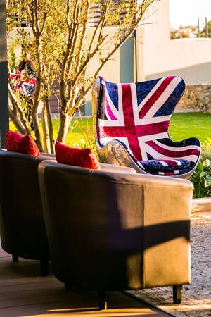 Union Jack British Flag couch with suspended chandelier at outdoor corporate eventの写真素材