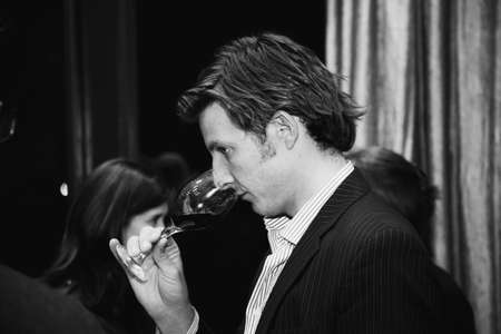 Johannesburg, South Africa - July 21, 2011: Various Caucasian people at wine tasting eventのeditorial素材