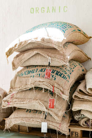 Johannesburg, South Africa - January 14, 2013: Large bags of raw coffee beans in a warehouse