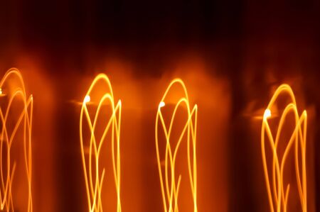 Red and yellow light streaks abstract pattern texture for design background