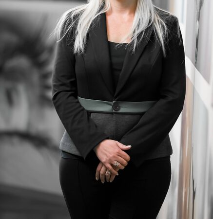 Cropped head Business Woman in corporate attire with hands in frontの写真素材