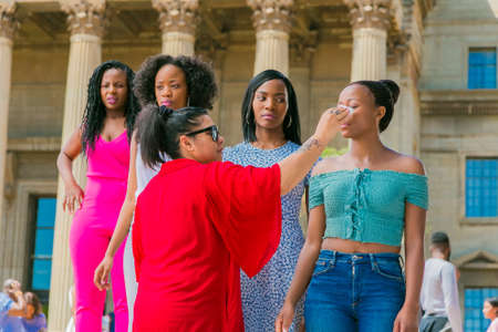 Johannesburg, South Africa - October 09 2018: Behind the Scenes Hair and Make-up on location shooting of television commercial advertのeditorial素材