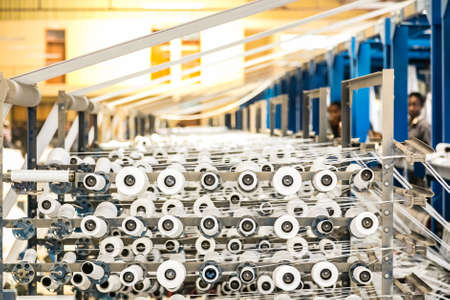 Addis Ababa, Ethiopia, January 30, 2014, Carpet Manufacturing, Weaving rugs out of plastic fibreのeditorial素材