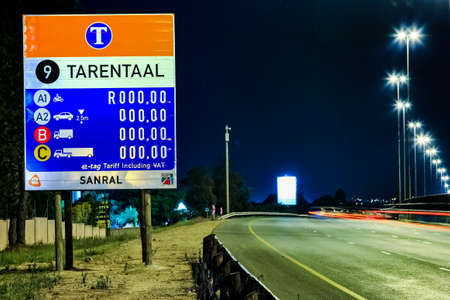 Johannesburg, South Africa - October 24 2011: Motorway Signs on Highway at night