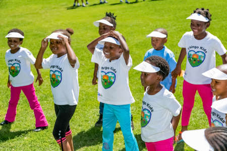 Johannesburg, South Africa - March 20, 2014: Diverse African Primary School children doing physical exercise PT lessonのeditorial素材