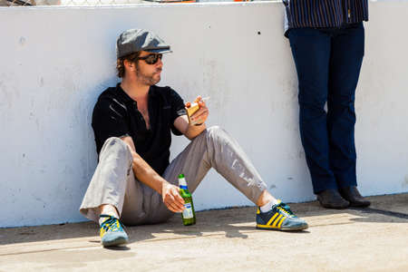 Johannesburg, South Africa - October 05 2013: Jay Kay of Jamiroquai relaxing with a Cigarette next...