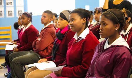 Cape Town, South Africa - December 7 2011: African High School Children and teacher in Classroom...