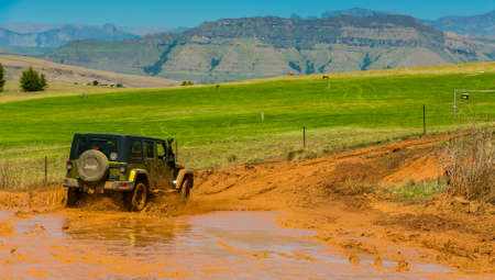 Harrismith, South Africa - October 02 2015: 4x4 Mud Driver Training at Camp Jeep in the Drakensberg