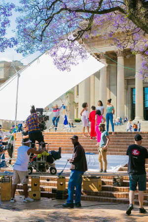 Johannesburg, South Africa - October 09 2018: Behind the scenes of a Television advert Film Set on location at a University Campusのeditorial素材