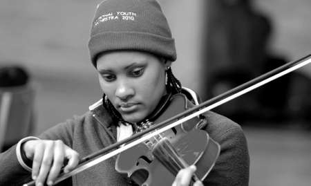 Johannesburg, South Africa - August 28 2010: Diverse youth at music school orchestraのeditorial素材
