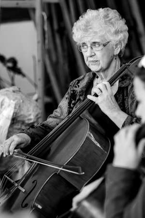 Johannesburg, South Africa - August 28 2010: Teacher at music school orchestra classのeditorial素材